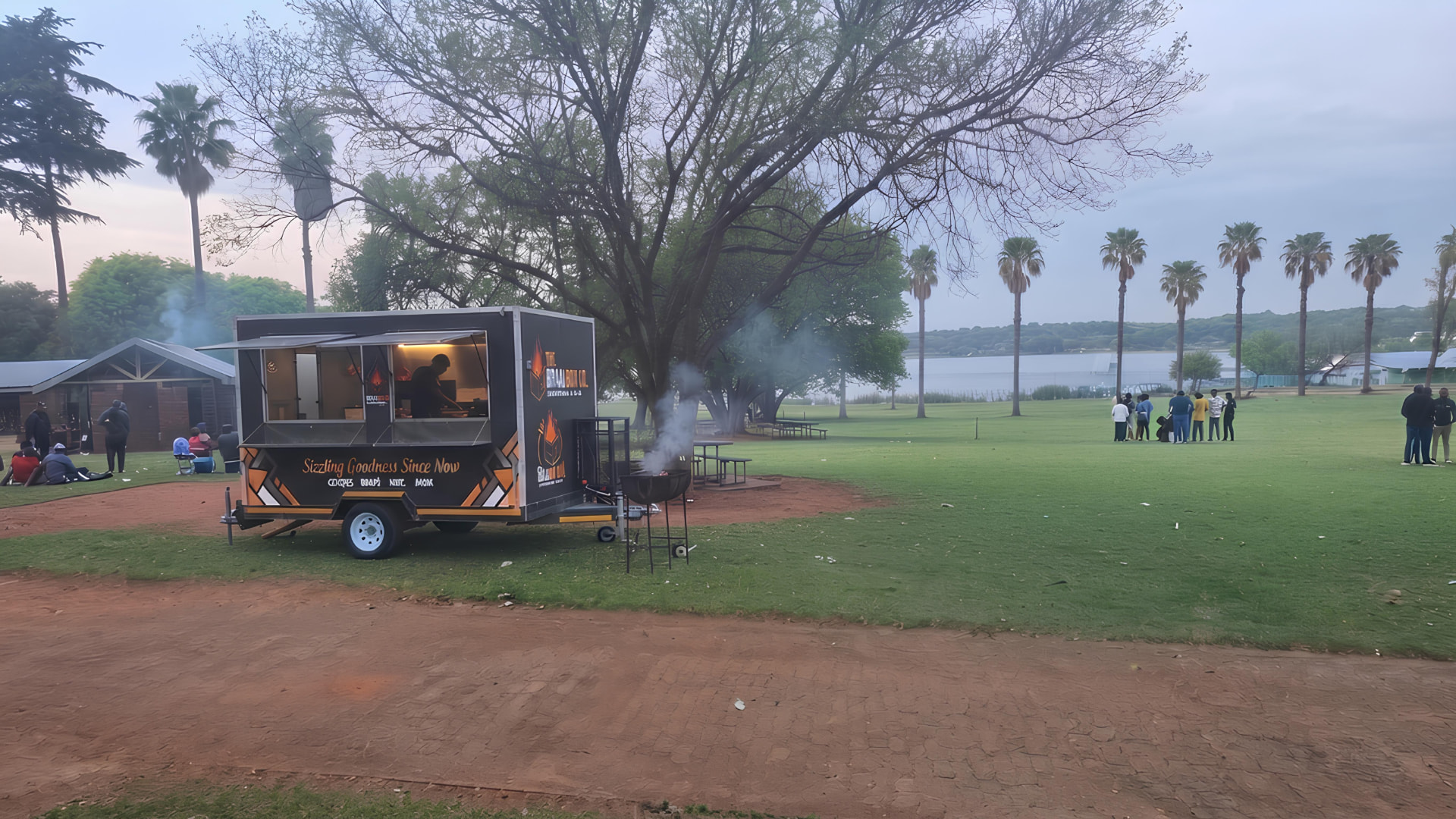 Concept visual · trailer set up beside the Florida Lake picnic lawns